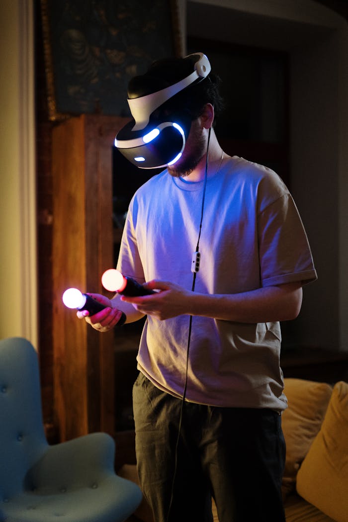 about-07 A young man wearing a VR headset and holding controllers, gaming at home with neon lights.