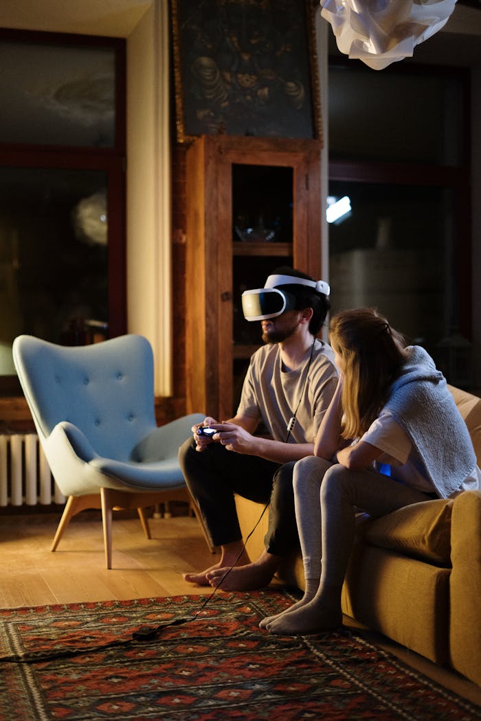 about-05 Couple enjoying virtual reality gaming in a cozy living room ambiance during the evening.